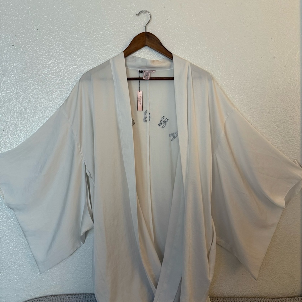 Victoria's Secret Light Cream Garment Women’s size XS logo ángel .